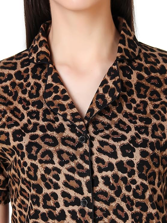 Leopard print shirt worn by a person on a white background