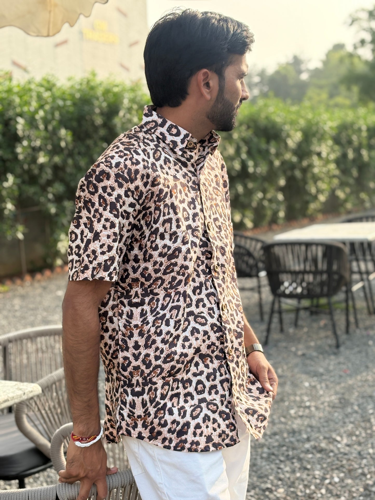 Close-up of back side animal print shirt design