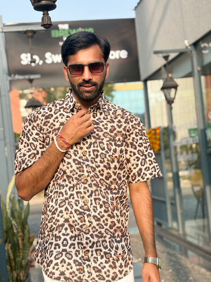 Back close-up highlighting animal print shirt texture