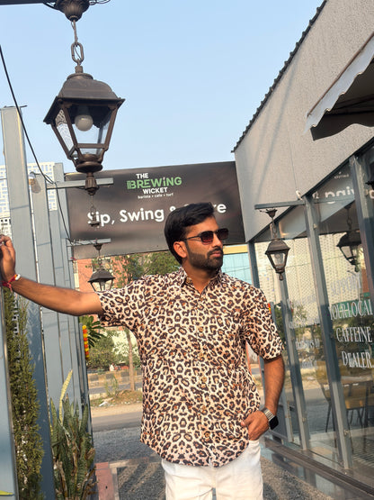 Men wearing beige animal print shirt