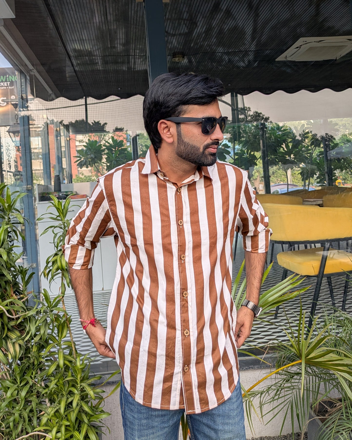 Men wearing brown and white striped shirt