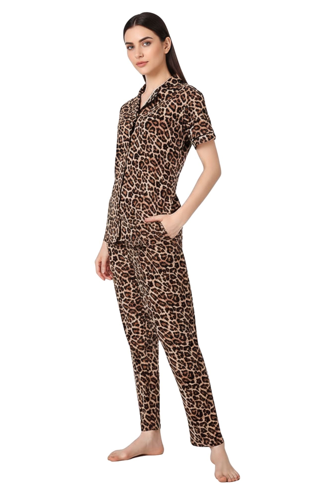 Woman wearing leopard print pajama set on a white background